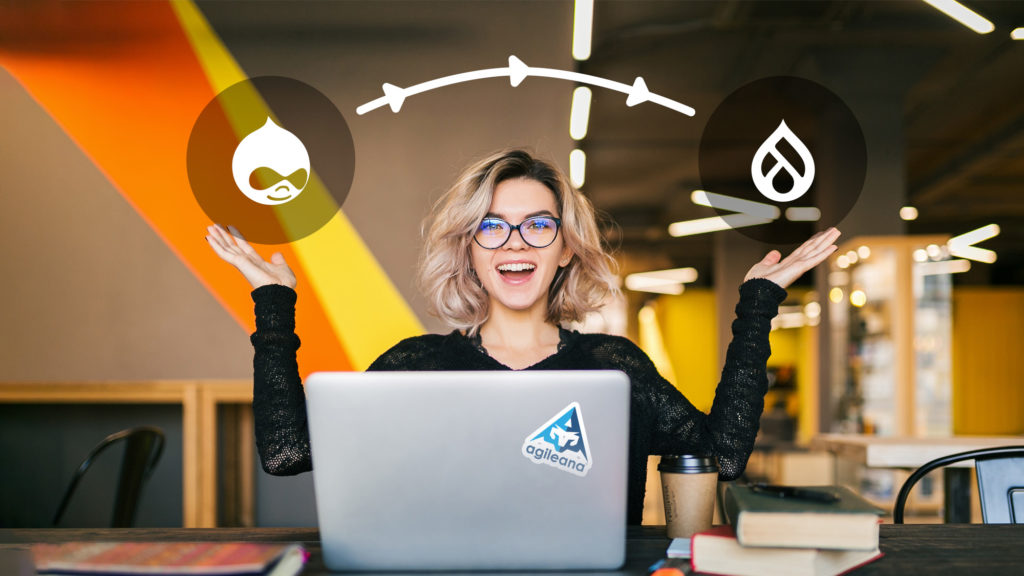Woman at laptop with Drupal migration icons in her hands